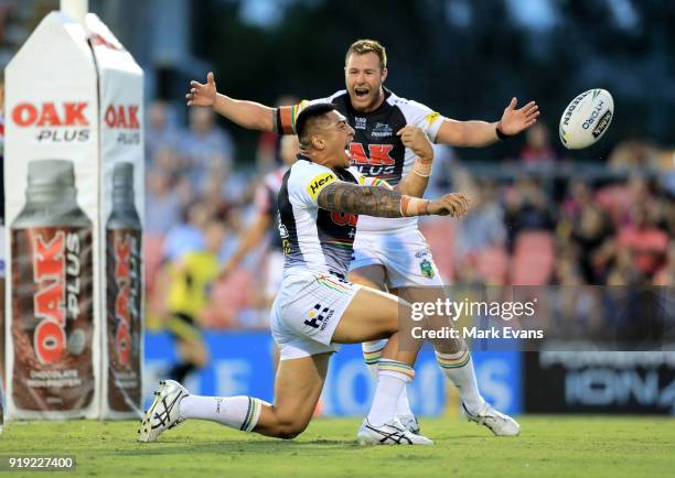 Moses Leota of the Panthers celebrates a try with Trent Merrin during the NRL trial match between the Penrith Panthers and the Sydney Roosters at...