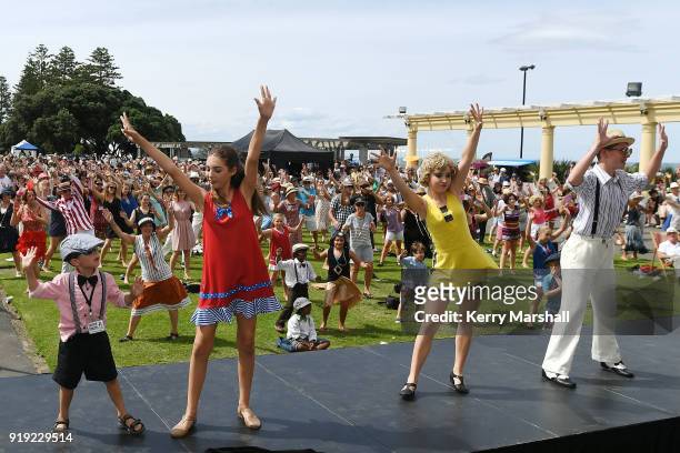 Crowds take part in a vintage dance lesson during the Art Deco Festival on February 17, 2018 in Napier, New Zealand. The annual five day festival...