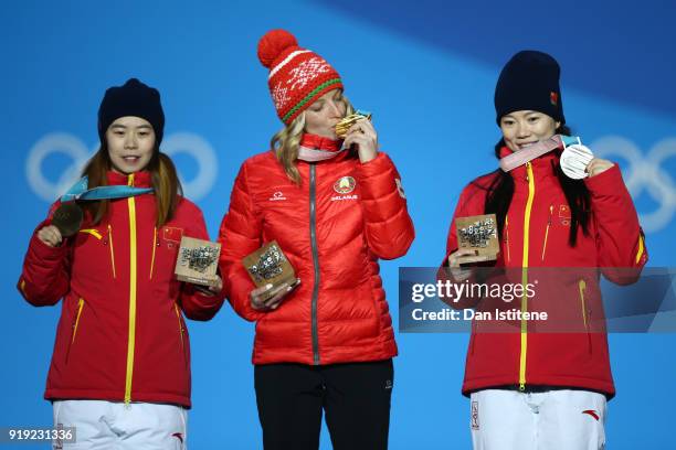 Silver medalist Xin Zhang of China, gold medalist Hanna Huskova of Belarus and bronze medalist Fanyu Kong of China celebrate during the medal...