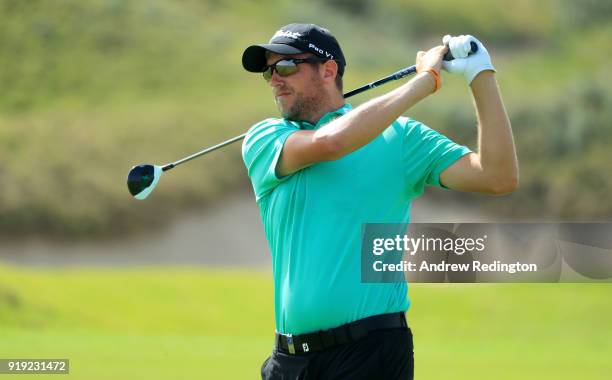 Matthew Southgate of England watches his shot on the 7th hole during the third round of the NBO Oman Open at Al Mouj Golf on February 17, 2018 in...