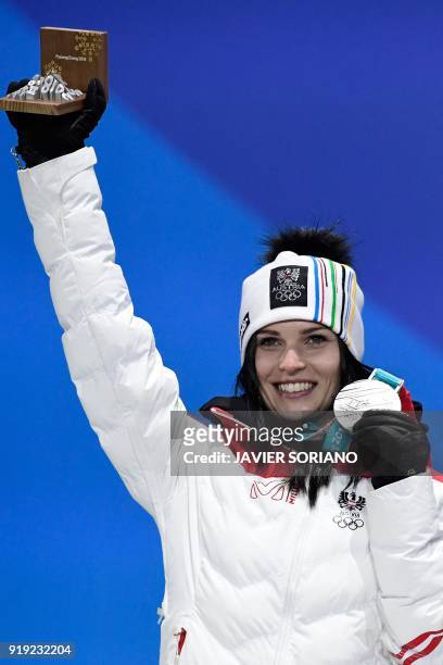 Austria's silver medallist Anna Fenninger Veith poses on the podium during the medal ceremony for the alpine skiing women's Super-G at the...