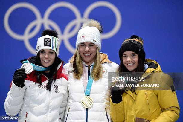 Austria's silver medallist Anna Fenninger Veith, Czech Republic's gold medallist Ester Ledecka and Liechtenstein's bronze medallist Tina Weirather...
