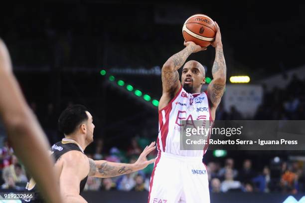 Jordan Theodore of Armani competes with Christian Burns of MIA during the LBA Legabasket of serie A match quartes final of Coppa Italia between...