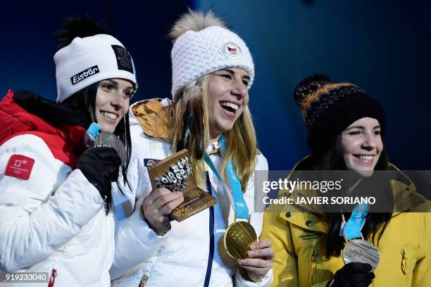 Austria's silver medallist Anna Fenninger Veith, Czech Republic's gold medallist Ester Ledecka and Liechtenstein's bronze medallist Tina Weirather...