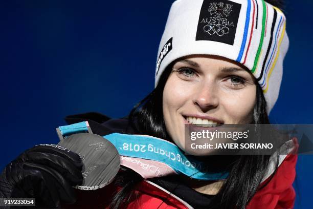 Austria's silver medallist Anna Fenninger Veith poses on the podium during the medal ceremony for the alpine skiing women's Super-G at the...