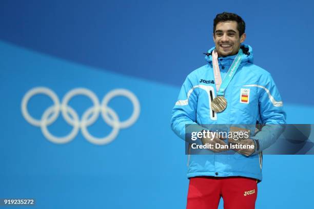 Bronze medalist Javier Fernandez of Spain celebrates during the medal ceremony for the Men's Figure Skating - Single Free Skating on day eight of the...