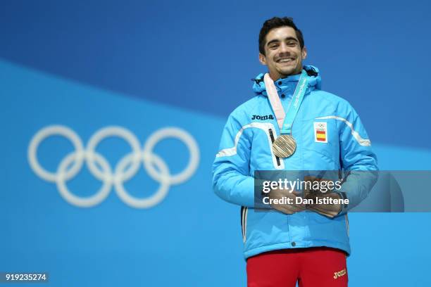 Bronze medalist Javier Fernandez of Spain celebrates during the medal ceremony for the Men's Figure Skating - Single Free Skating on day eight of the...