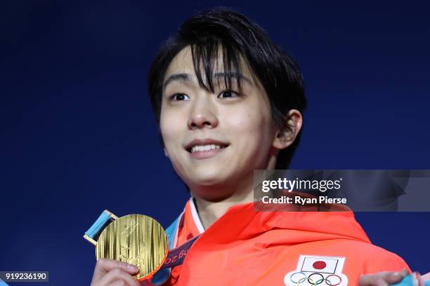 Gold medalist Yuzuru Hanyu of Japan celebrates during the medal ceremony for the Men's Figure Skating - Single Free Skating on day eight of the...