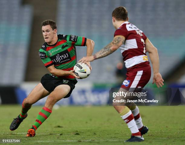 Connor Tracey of the Rabbitohs looks to pass during the NRL trial match between the South Sydney Rabbitohs and Wigan at ANZ Stadium on February 17,...