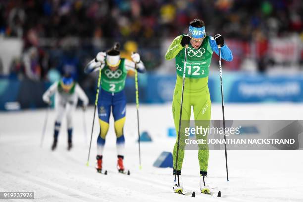 Slovenia's Katja Visnar competes during the women's 4x5km classic free style cross country relay at the Alpensia cross country ski centre during the...