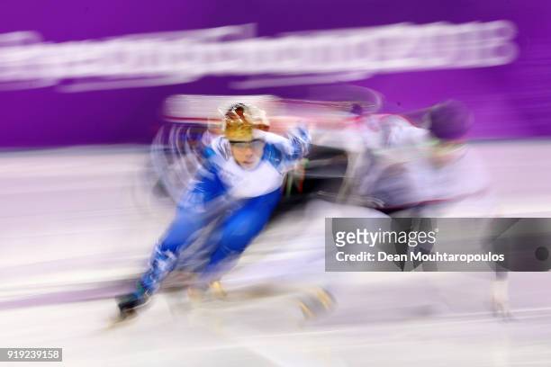 Semen Elistratov of Olympic Athlete from Russia competes during the Short Track Speed Skating Men's 1000m Quarterfinals on day eight of the...
