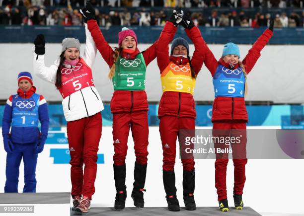 Bronze medalists Natalia Nepryaeva, Yulia Belorukova, Anastasia Sedova and Anna Nechaevskaya of Olympic Athlete from Russia celebrate on the podum...