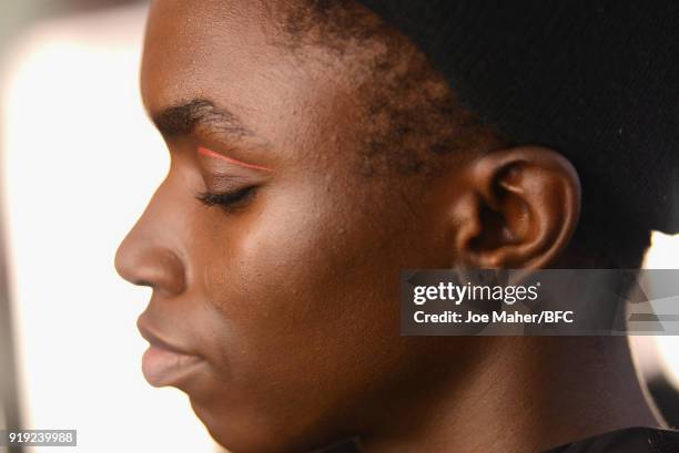 Model backstage ahead of the Osman Presentation during London Fashion Week February 2018 at Mary Ward House on February 17, 2018 in London, England.