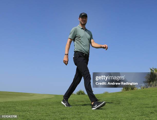 Chris Wood of England walks off the ninth green during the third round of the NBO Oman Open at Al Mouj Golf on February 17, 2018 in Muscat, Oman.