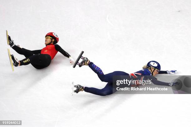 Jinyu Li of China and Elise Christie of Great Britain fall during the Short Track Speed Skating Ladies' 1500m Semifinals on day eight of the...