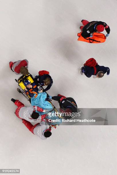 Elise Christie of Great Britain is taken off the ice on a stretcher after a collision during the Short Track Speed Skating Ladies' 1500m Semifinals...