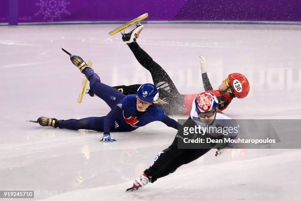Jinyu Li of China and Elise Christie of Great Britain fall as Minjeong Choi of Korea skates past during the Short Track Speed Skating Ladies' 1500m...