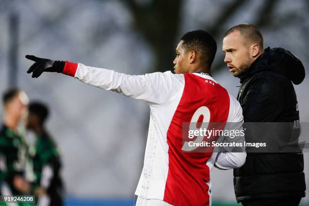 Danilo Pereira da Silva of Ajax U19, coach John Heitinga of Ajax U19 during the match between Ajax U19 v Feyenoord U19 at the De Toekomst on February...
