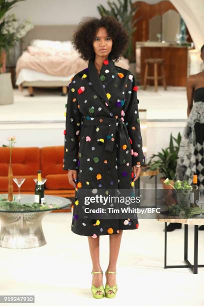 Model poses at the Osman Presentation during London Fashion Week February 2018 at Mary Ward House on February 17, 2018 in London, England.