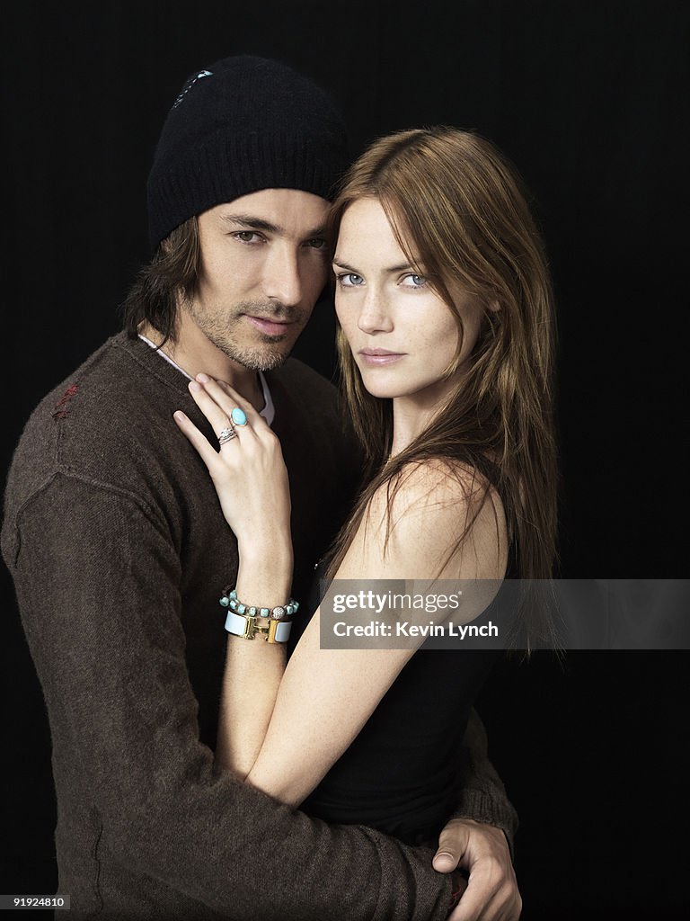 Model Mini Anden and her husband model Taber Schroeder poses for a