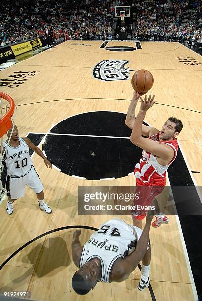 Ioannis Bourousis of the Greece Olympiacos puts up a shot against DeJuan Blair of the San Antonio Spurs during the exhibition game on October 9, 2009...