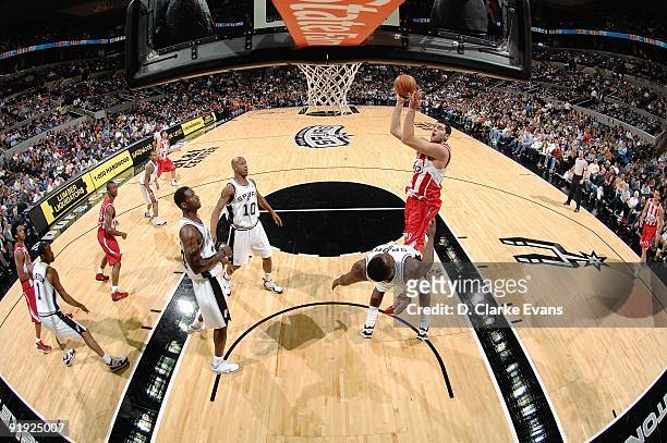 Ioannis Bourousis of the Greece Olympiacos puts up a shot against DeJuan Blair of the San Antonio Spurs during the exhibition game on October 9, 2009...