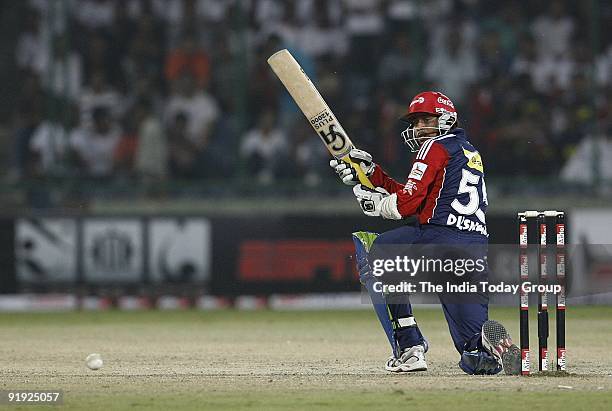 Tillakaratne Dilshan of Delhi Daredevils team sweeps against Victoria Bushrangers at New Delhi's Kotla Stadium during Airtel's Champions League.