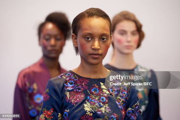 Models pose at the Alice Archer Presentation during London Fashion Week February 2018 on February 17, 2018 in London, England.
