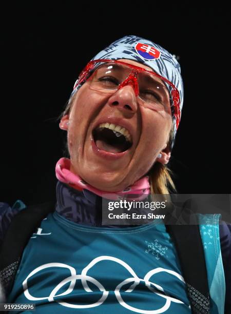 Anastasiya Kuzmina of Slovakia celebrates as she wins gold during the Women's 12.5km Mass Start Biathlon on day eight of the PyeongChang 2018 Winter...