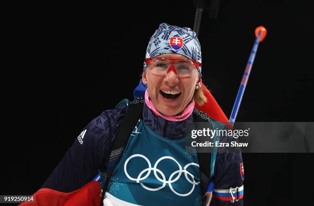 Anastasiya Kuzmina of Slovakia celebrates as she wins gold during the Women's 12.5km Mass Start Biathlon on day eight of the PyeongChang 2018 Winter...