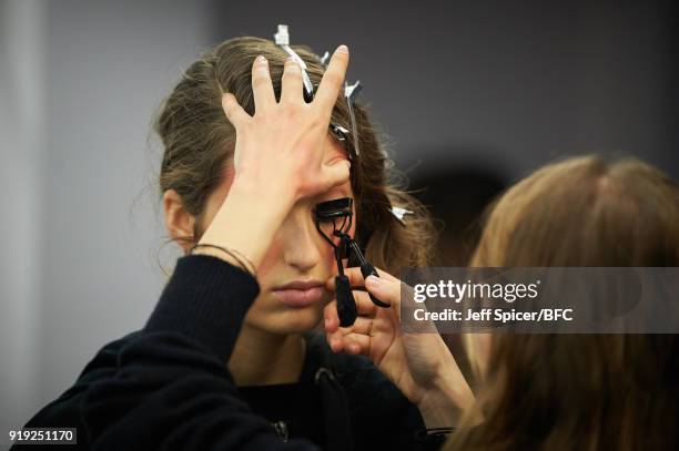 Model backstage ahead of the Alice Archer Presentation during London Fashion Week February 2018 on February 17, 2018 in London, England.