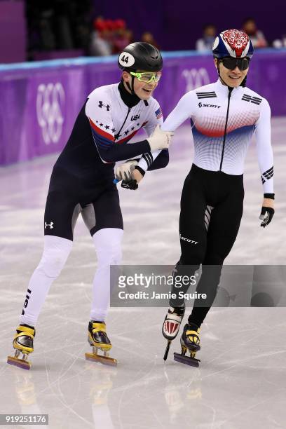 John-Henry Krueger of the United States and Yira Seo of Korea celebrate after coming in first and second in their race during the Short Track Speed...