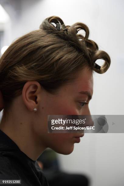 Model backstage ahead of the Alice Archer Presentation during London Fashion Week February 2018 on February 17, 2018 in London, England.