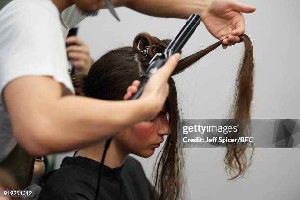 Model backstage ahead of the Alice Archer Presentation during London Fashion Week February 2018 on February 17, 2018 in London, England.