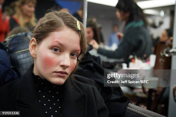 Model backstage ahead of the Alice Archer Presentation during London Fashion Week February 2018 on February 17, 2018 in London, England.