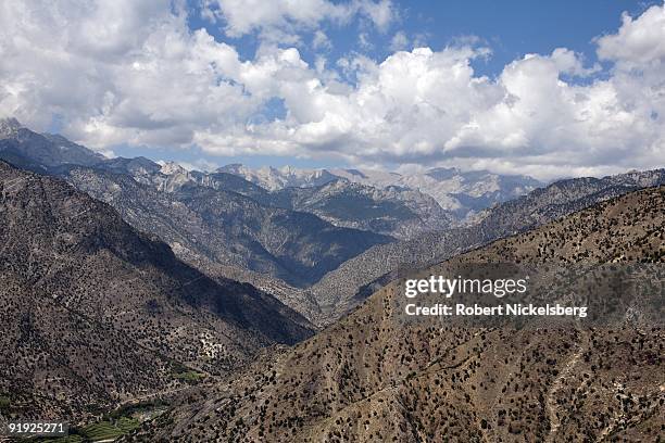 Army soldiers from the 4th Infantry Division's 4th Brigade, 2nd Battalion - 12th Infantry Regiment, based in Fort Carson, Colorado, fly through...