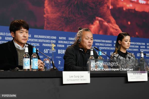 Lee Sung-jae, Kim Ki-duk and Mina Fujii are seen at the 'Human, Space, Time and Human' press conference during the 68th Berlinale International Film...