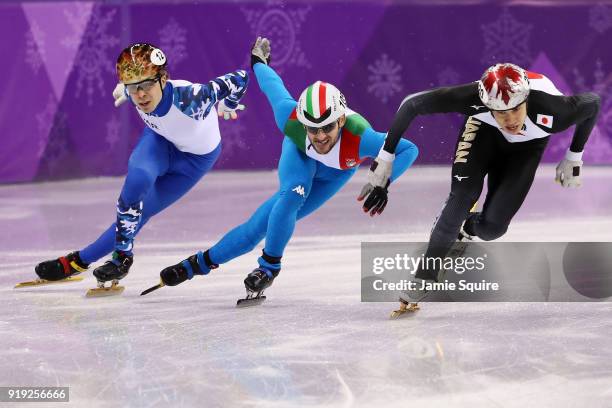 Semen Elistratov of Olympic Athlete from Russia, Yuri Confortola of Italy and Ryosuke Sakazume of Japan compete during the Short Track Speed Skating...