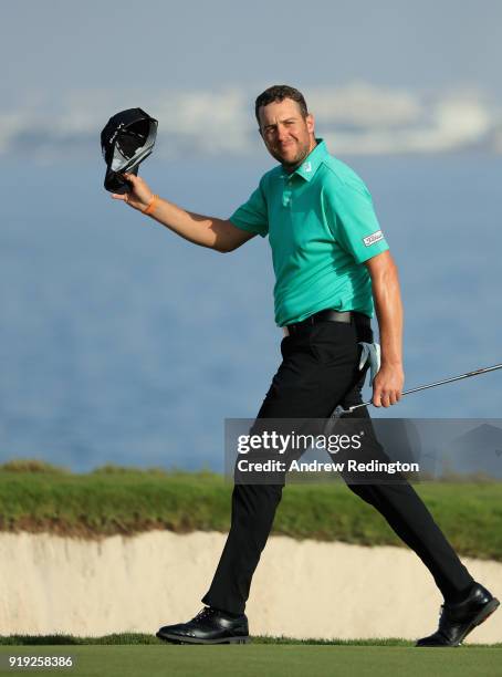 Matthew Southgate of England celebrates his birdie on the 18th hole during the third round of the NBO Oman Open at Al Mouj Golf on February 17, 2018...