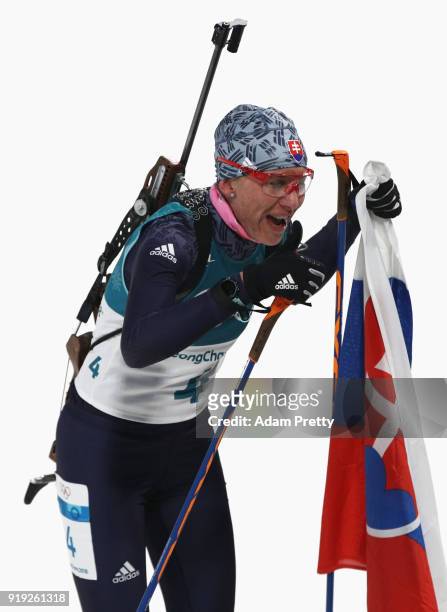 Anastasiya Kuzmina of Slovakia celebrates winning the gold medal during the Women's 12.5km Mass Start Biathlon on day eight of the PyeongChang 2018...