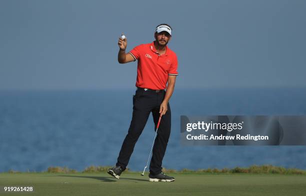 Joost Luiten of The Netherlands waves to the crowd on the 18th hole during the third round of the NBO Oman Open at Al Mouj Golf on February 17, 2018...