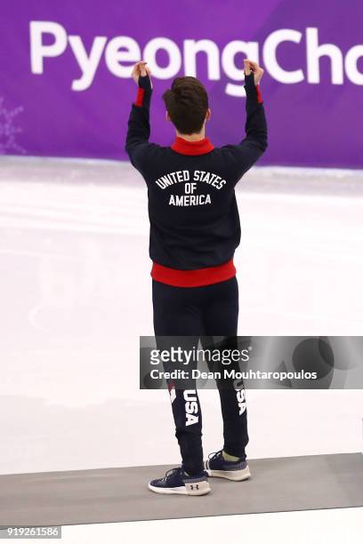 Silver medalist John-Henry Krueger of the United States celebrates during the victory ceremony after the Short Track Speed Skating Men's 1000m Final...