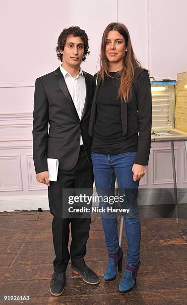 Alex Dellal and Charlotte Casiraghi attend the opening night of 'The Embassy' exhibition at 33 Portland Place on October 15, 2009 in London, England.