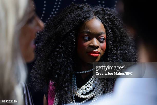 Model backstage ahead of the Lulu Guinness Presentation during London Fashion Week February 2018 at Betterton Street on February 17, 2018 in London,...