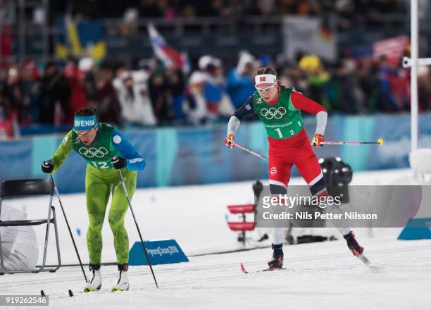 Katja Visnar of Slovenia and Astrid Uhrenholdt Jacobsen of Norway during the Womens 4x5km Relay Cross-Country Skiing on day eight of the PyeongChang...