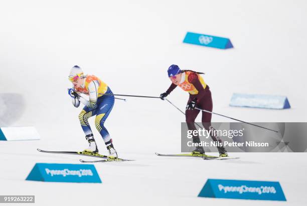 Ebba Andersson of Sweden and Anastasia Sedova of Olympic Athletes of Russia during the Womens 4x5km Relay Cross-Country Skiing on day eight of the...