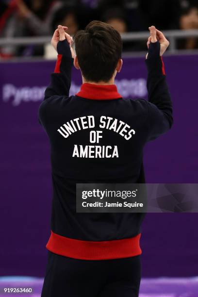 Silver medalist John-Henry Krueger of the United States celebrates during the victory ceremony after the Short Track Speed Skating Men's 1000m Final...