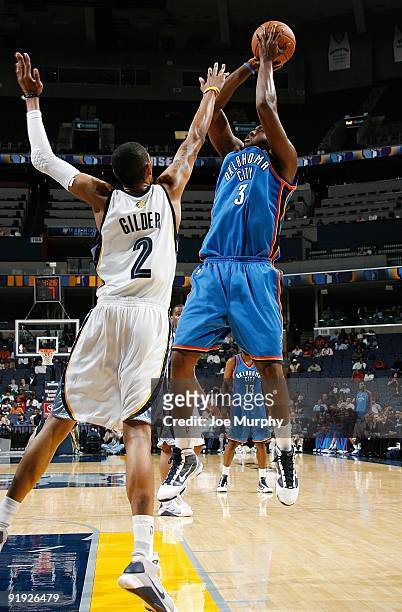 White of the Oklahoma City Thunder shoots the ball over Trey Gilder of the Memphis Grizzlies during the preseason game on October 7, 2009 at...