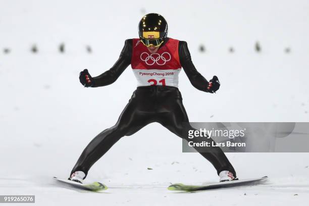 Michael Hayboeck of Austria reacts at the finish after he makes a jump during the Ski Jumping - Men's Large Hill on day eight of the PyeongChang 2018...