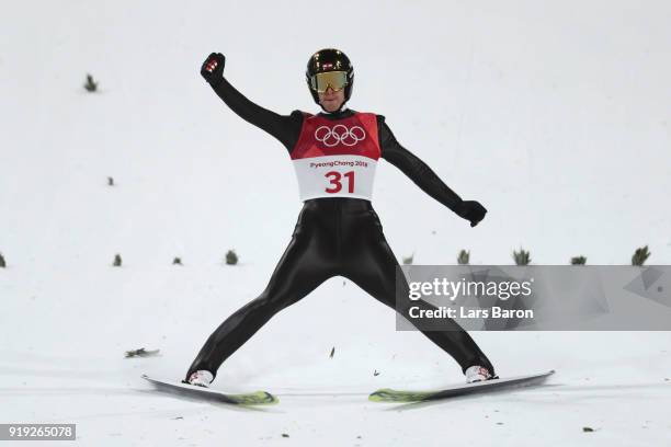 Michael Hayboeck of Austria reacts at the finish after he makes a jump during the Ski Jumping - Men's Large Hill on day eight of the PyeongChang 2018...